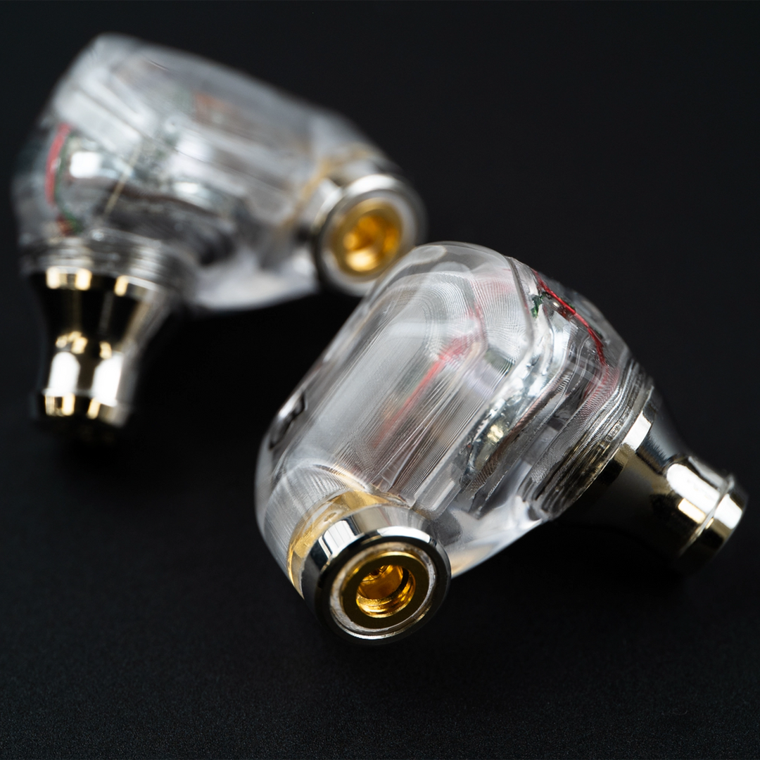 Campfire Audio Iris IEMs sitting closeup of nozzle on black background