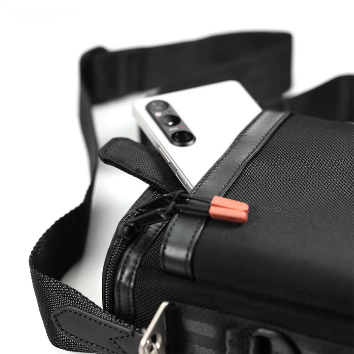 ddHiFi CZ200 Cube Bucket Bag lying face up closeup of phone coming out of pocket whitebox