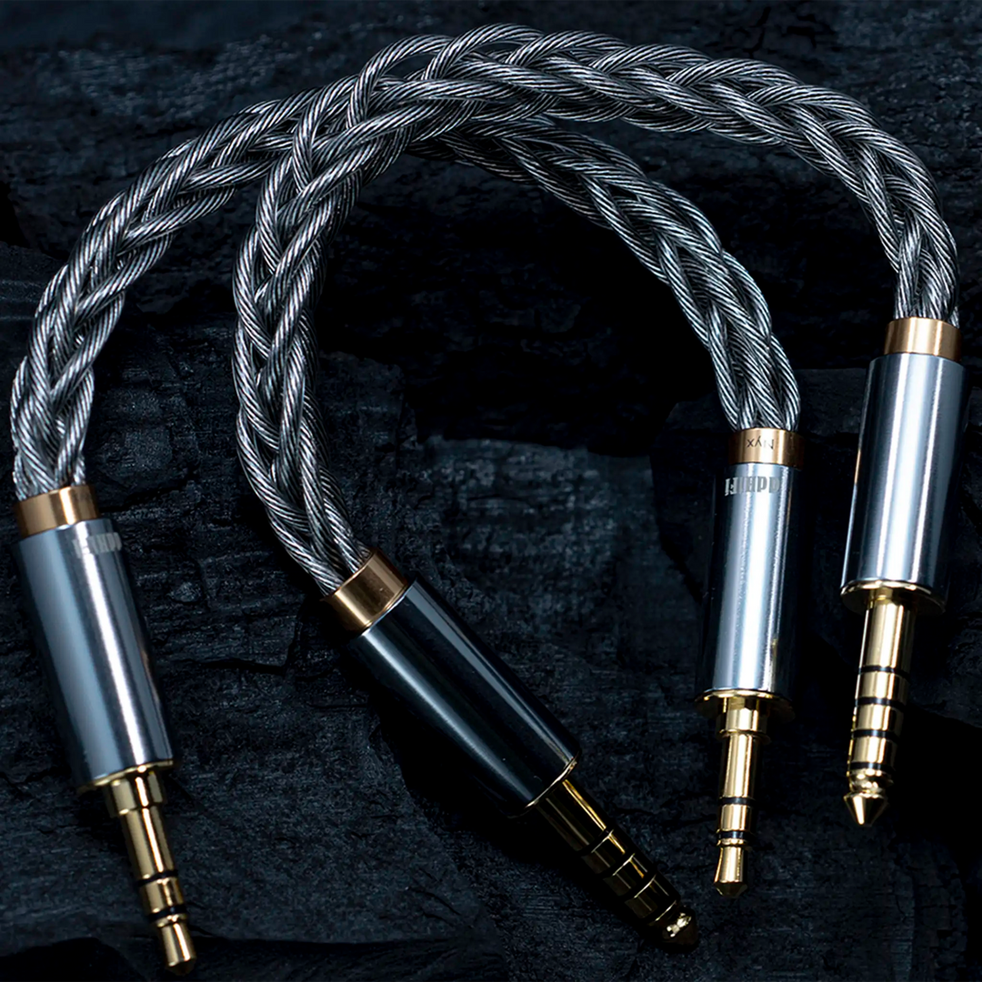 ddHiFi BC35B and BC44B interconnect cables closeup on black rock background