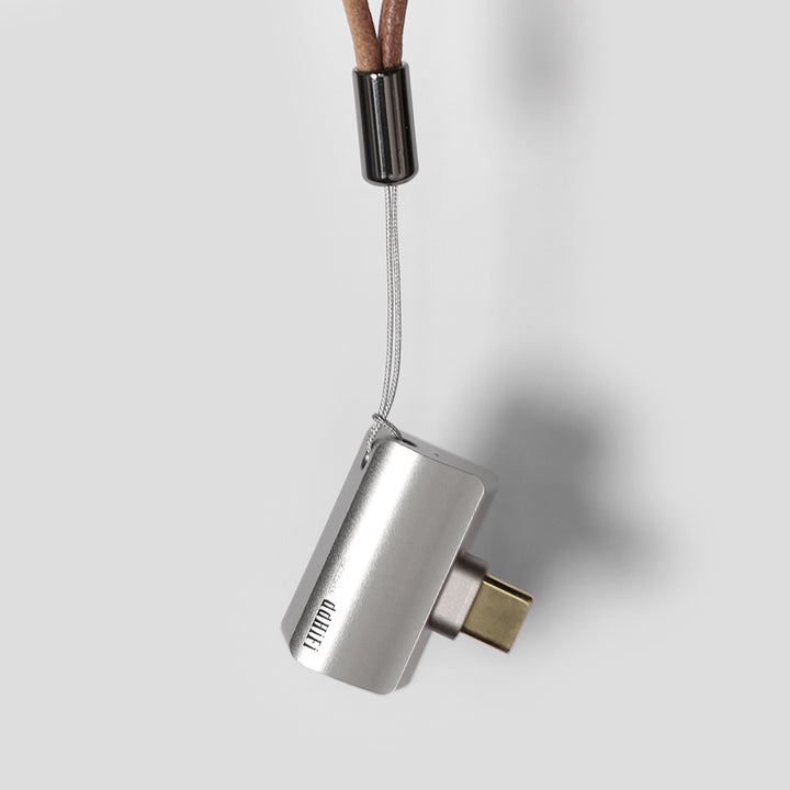 ddHiFi TC44Pro USB-C hanging from attached leather lanyard