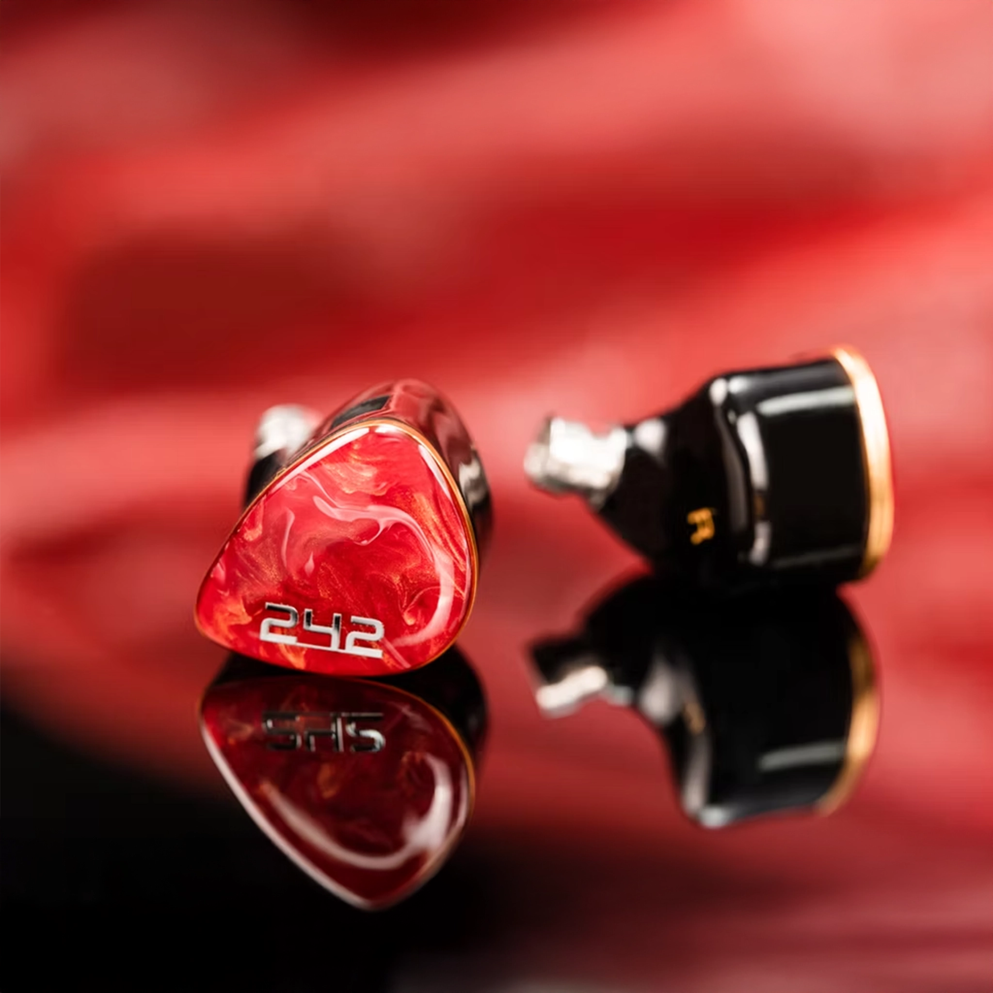 DUNU DN242 iems left front view right side view on red reflective background