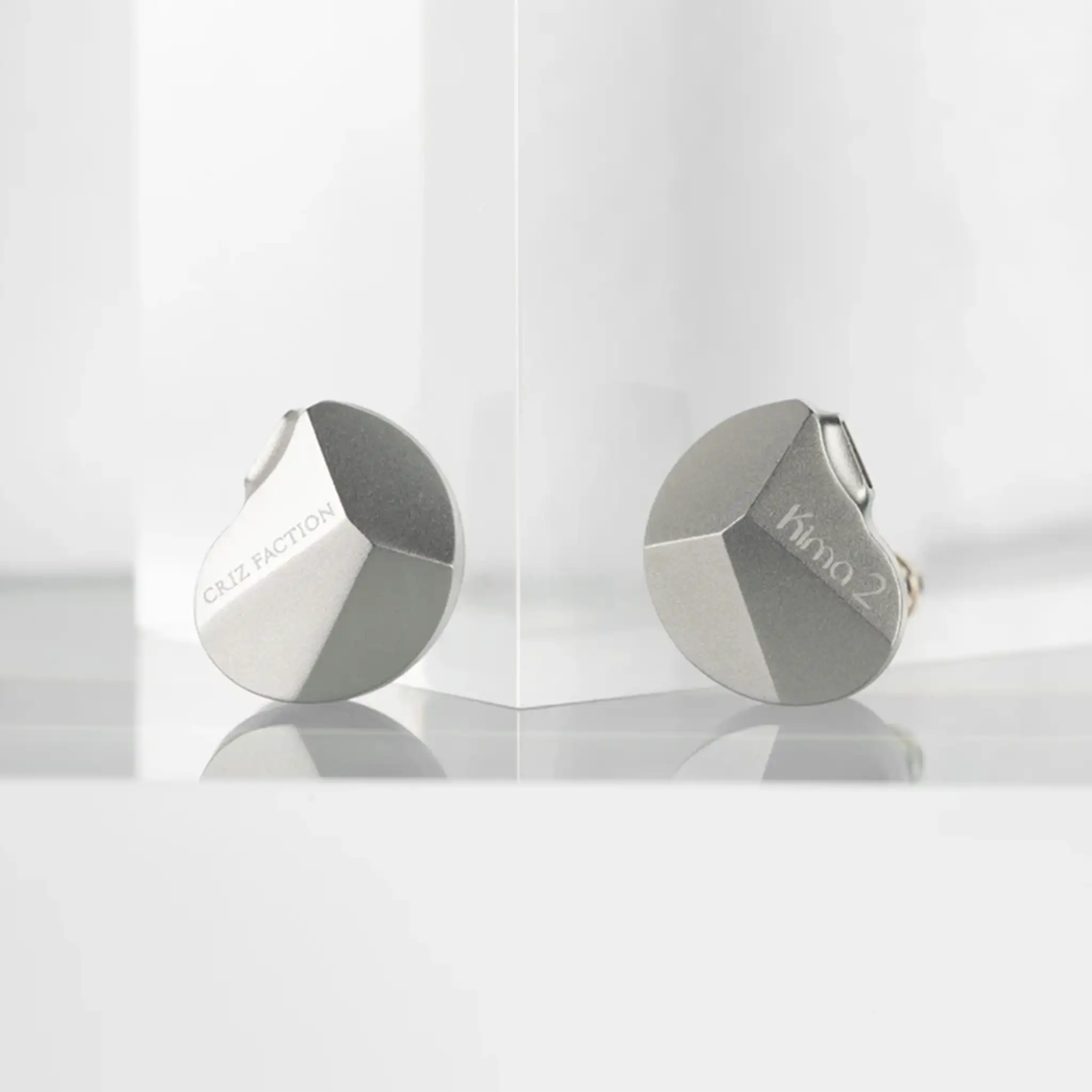 DUNU Kima 2 IEMs text closeup sitting on white background