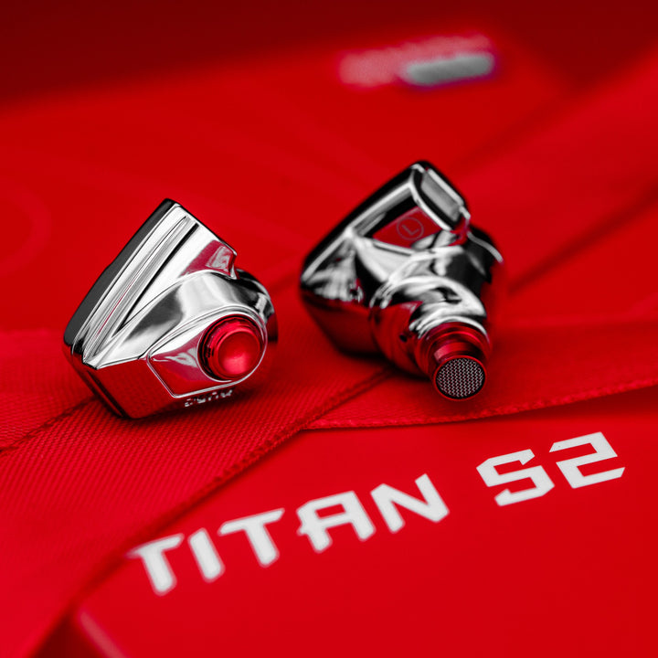 DUNU Titan S2 IEMs closeup over red box