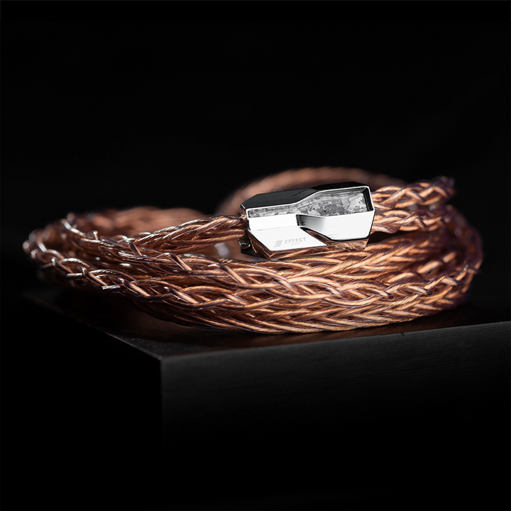 Effect Audio Ares 10 cable coiled in circle sitting on black box