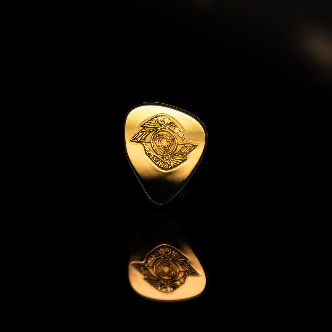 Empire Ears Raven gold launch edition single earphone over black reflective background from ECT gallery