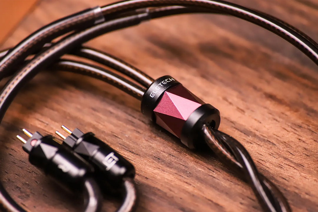 Eletech Eclipse IEM cable Y-split closeup on wooden table