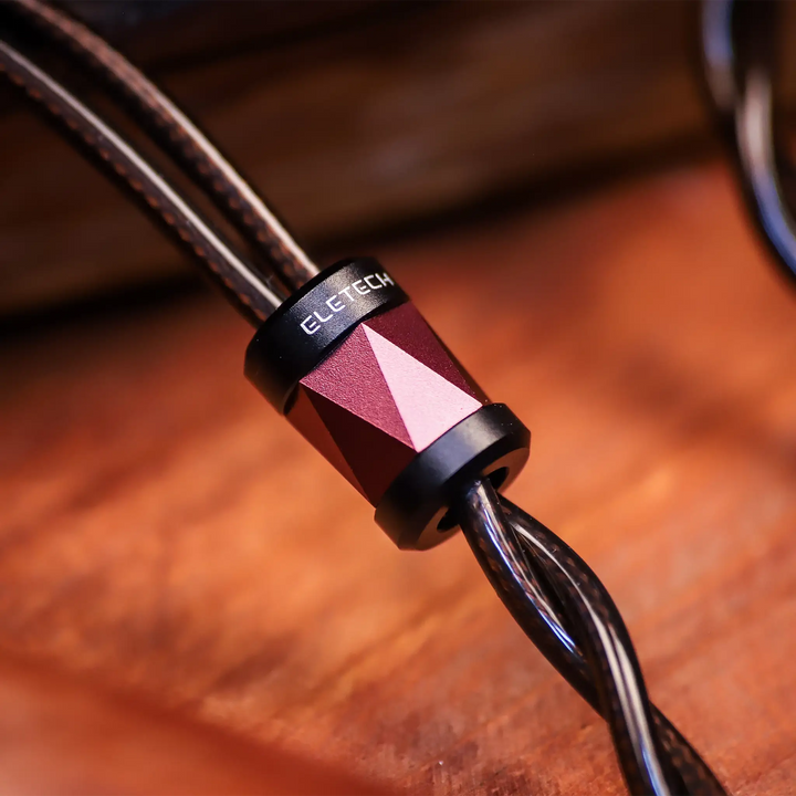 Eletech Eclipse IEM cable y-split closeup on wood background