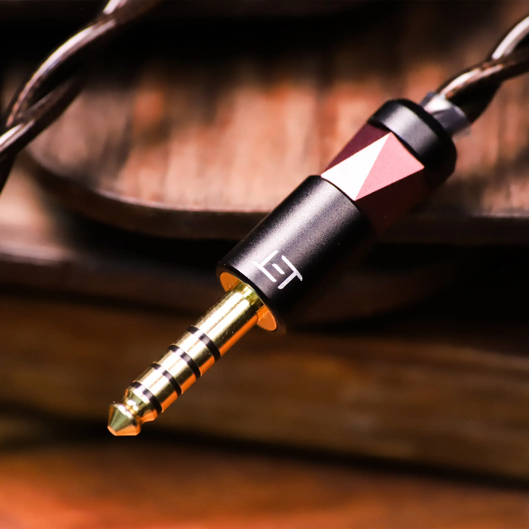 Eletech Eclipse IEM cable termination closeup on wood background