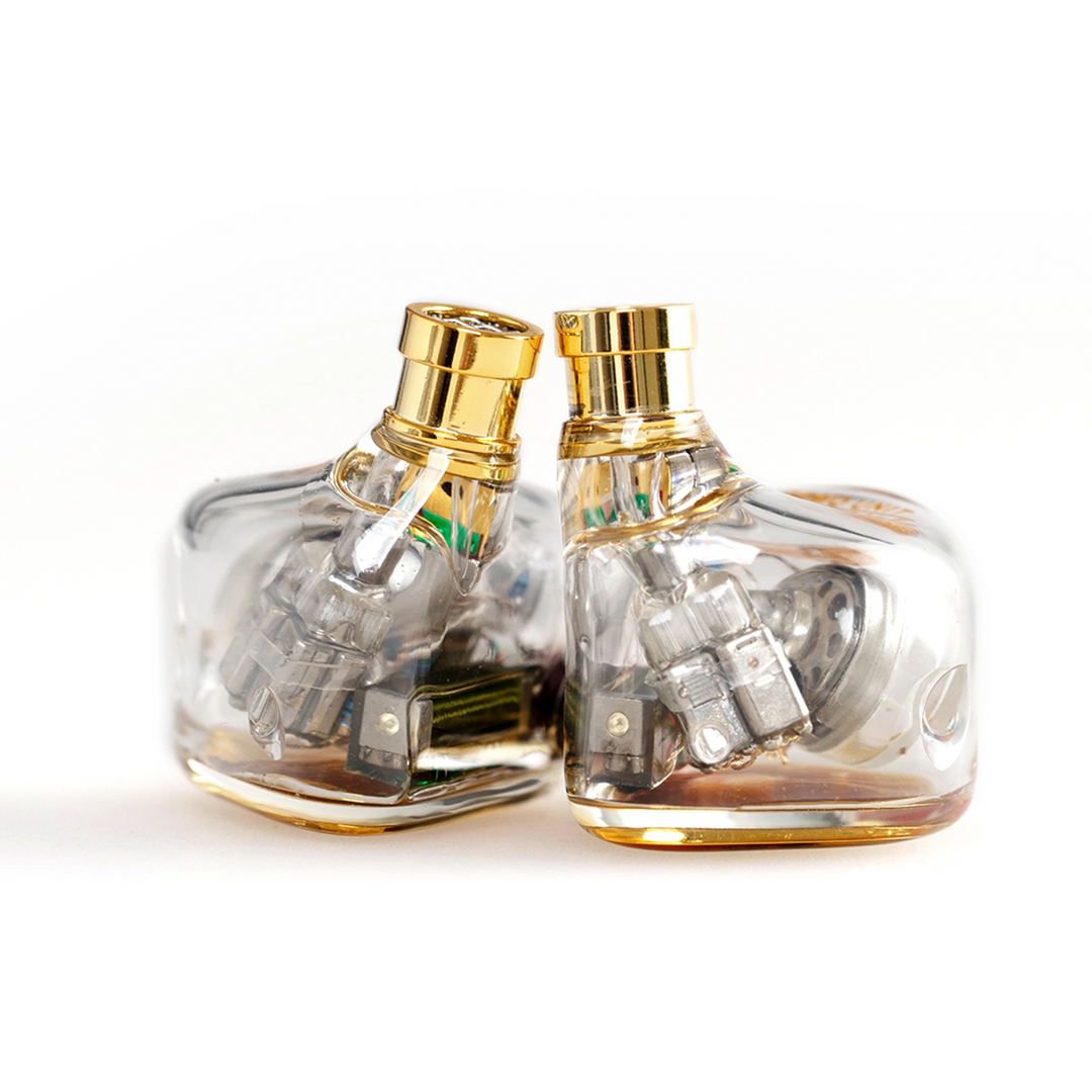 Elysian Annihilator 2026 iems sitting face down view of drivers through clear shell whitebox