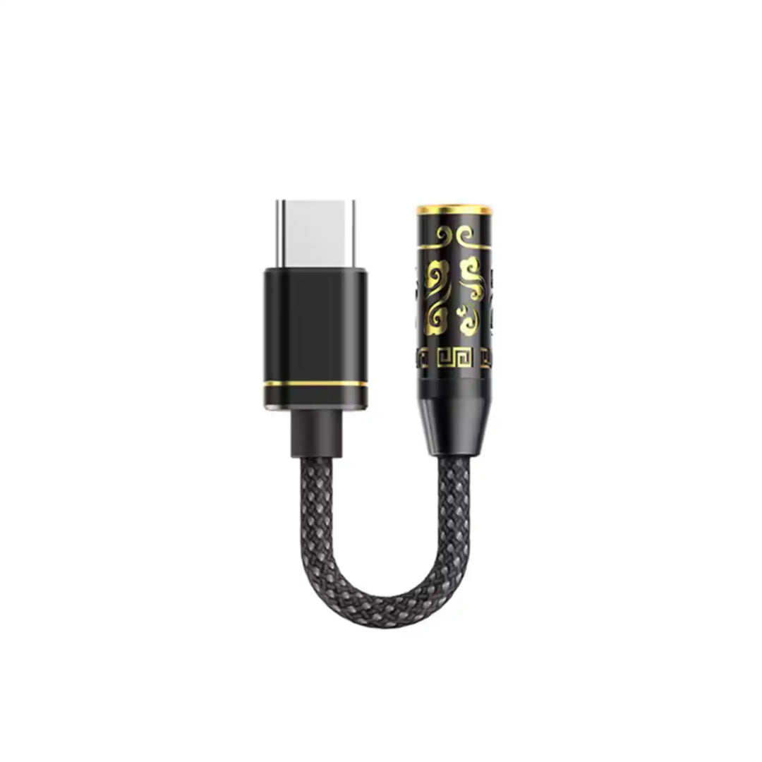 FiiO JIEZI A DAC/amp in black/gold floating whitebox