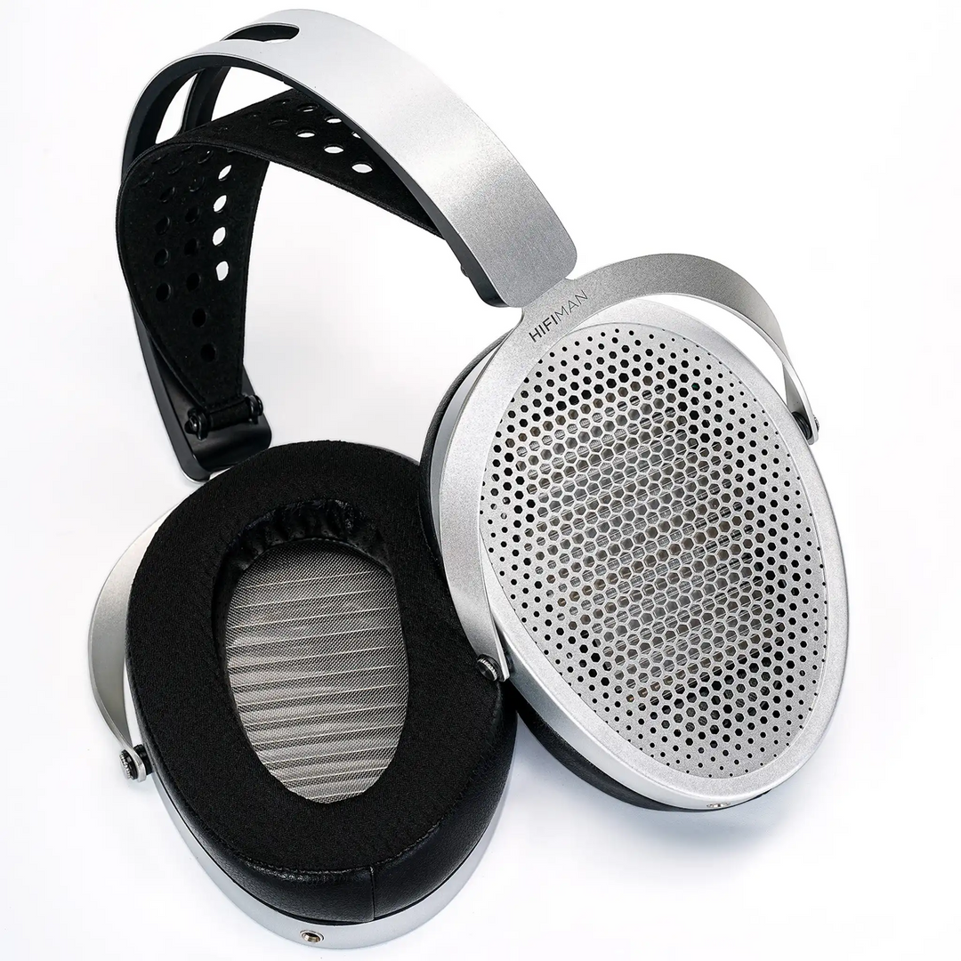 HIFIMAN Edition XV headphones lying open with view of ear cushion and front of ear cup grille whitebox