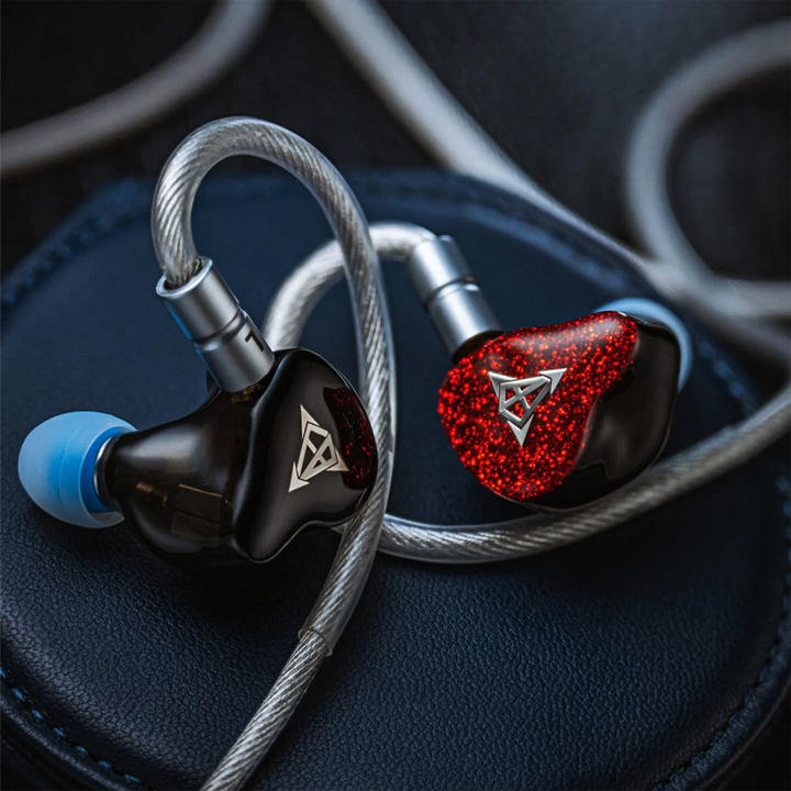 Hisenior Mega5-EST Bass+ iems attached to cable sitting on manatee carry case