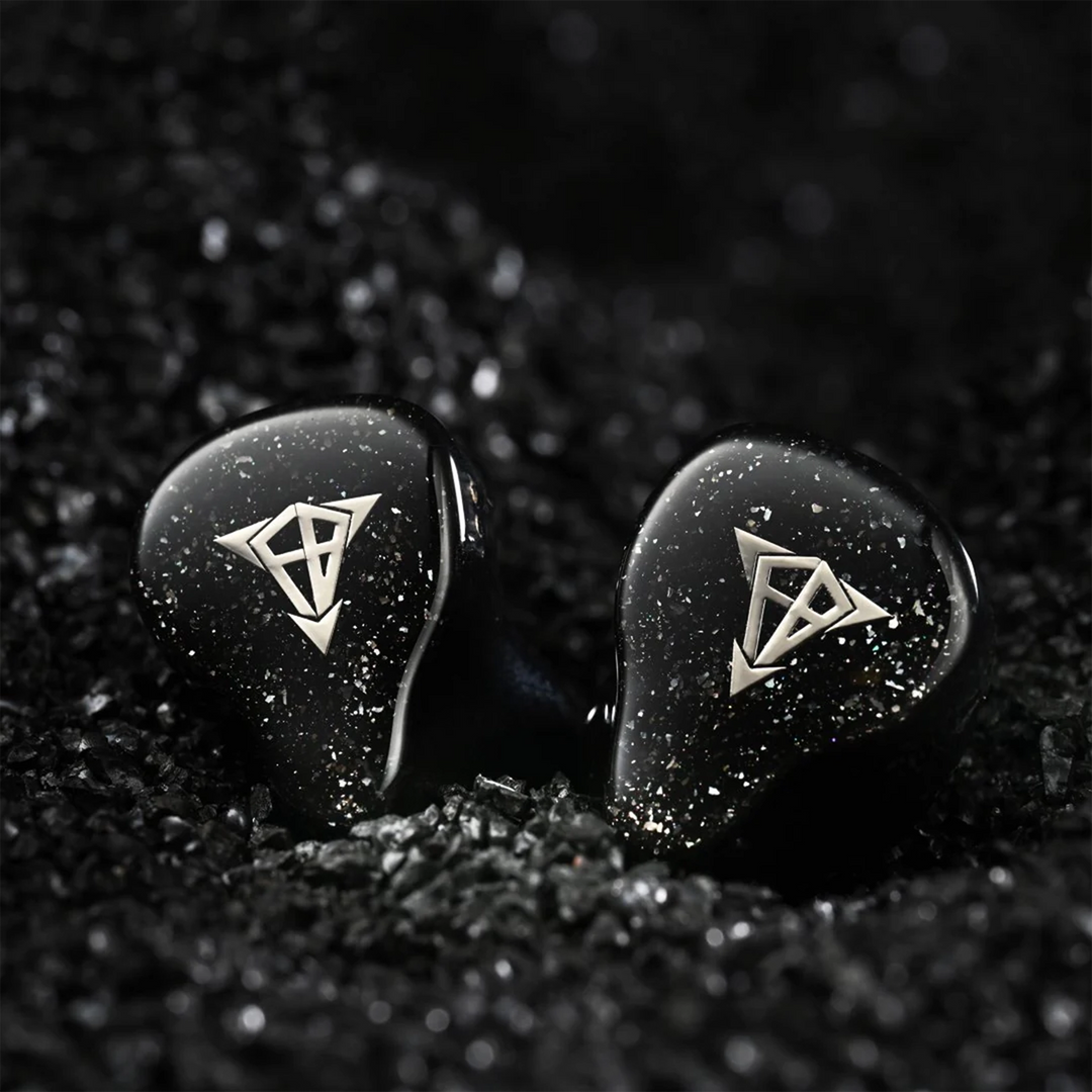 Hisenior Mega7 iems front sitting on black rock background