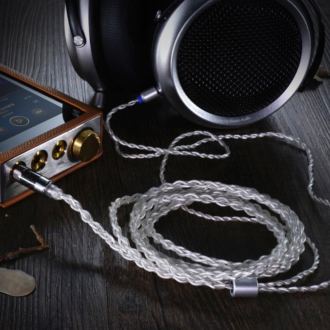 iBasso CB17 silver cable coiled and attached to SR-2 headphone and DX320 Ti music player