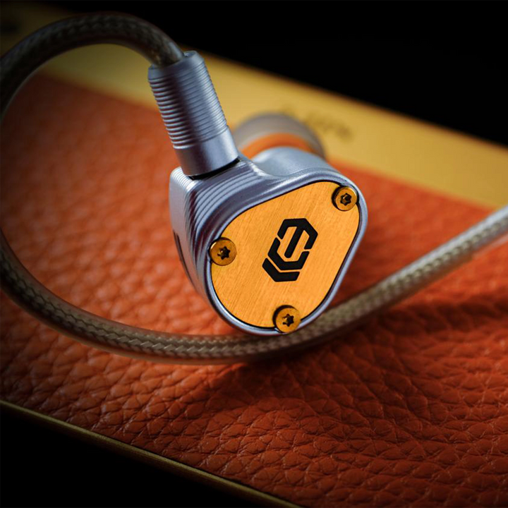Ice Lab Lumira IEM with cable attached sitting on carrying case