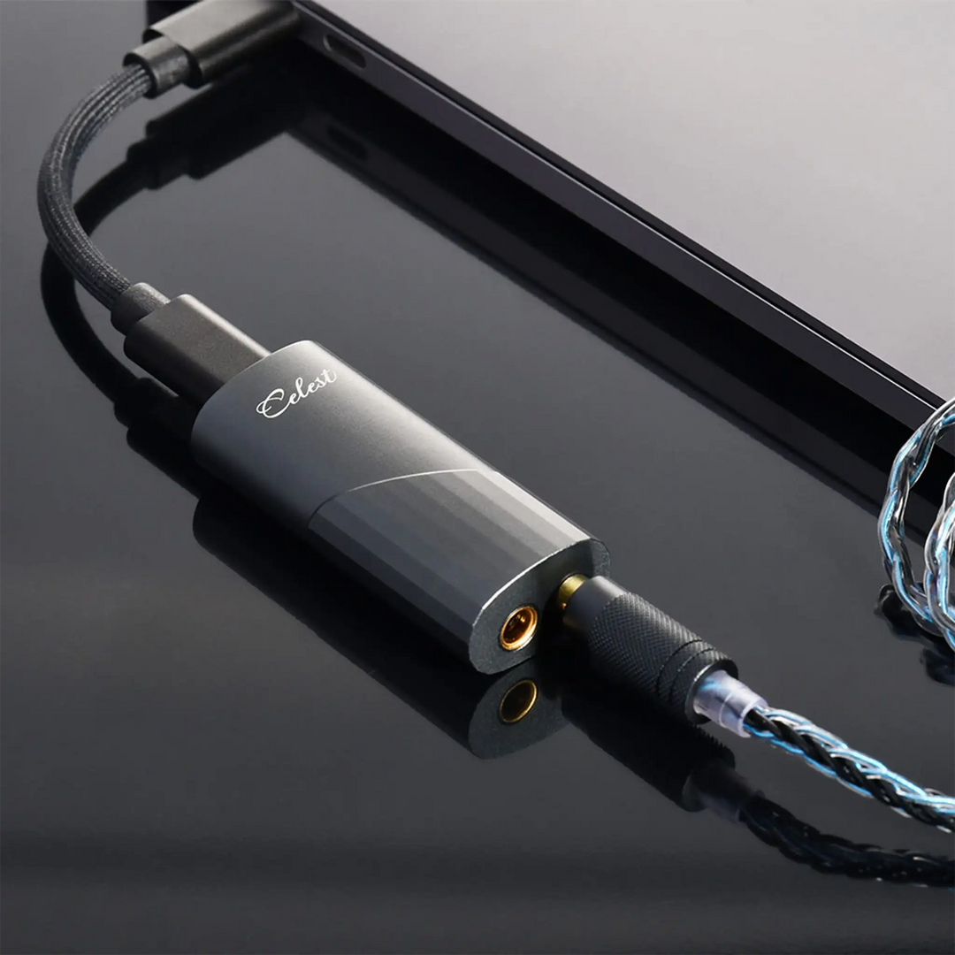 Kinera Celest CD-20 with attached IEM cable and USB cable connected to laptop