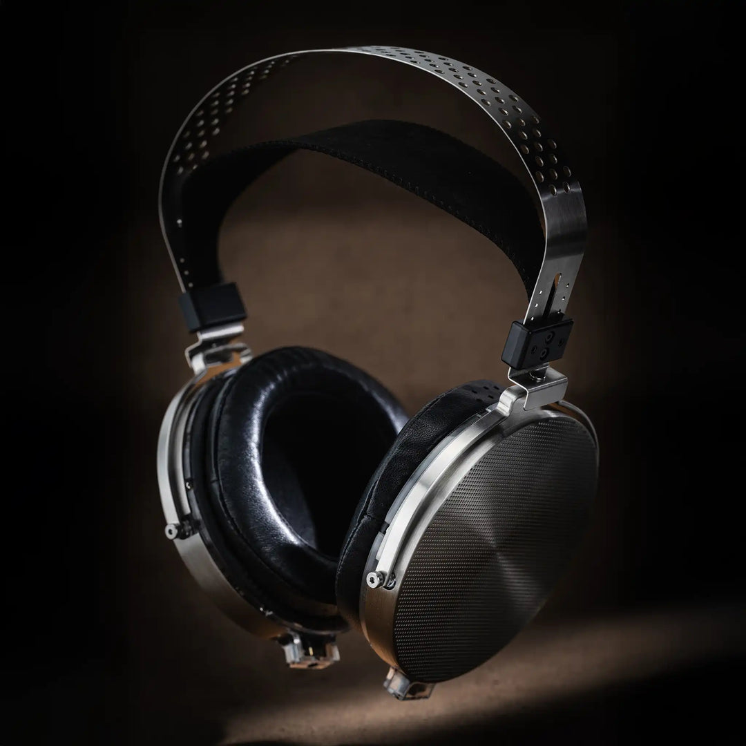 Moondrop Para 2 headphones front right 3 quarter view on brown textured backdrop