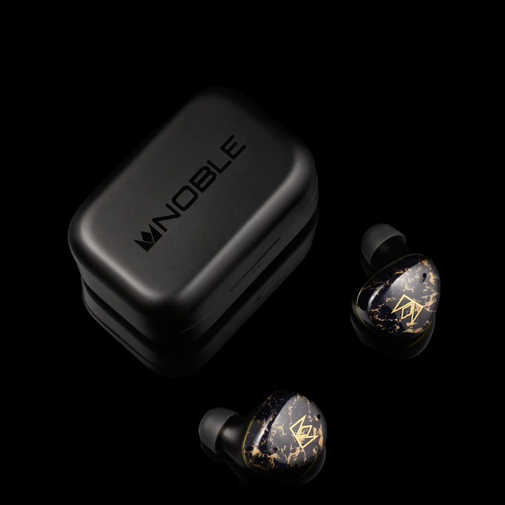 Noble Audio FoKus Rex5 tws earphones in black sitting in front of charging case at left 3 quarter angle on black background