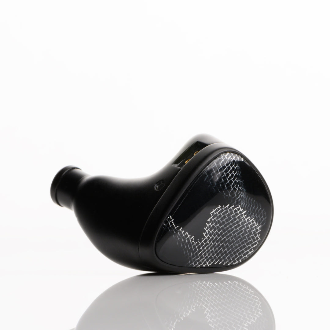 Noble Audio Onyx extreme closeup front quarter left earphone over white background