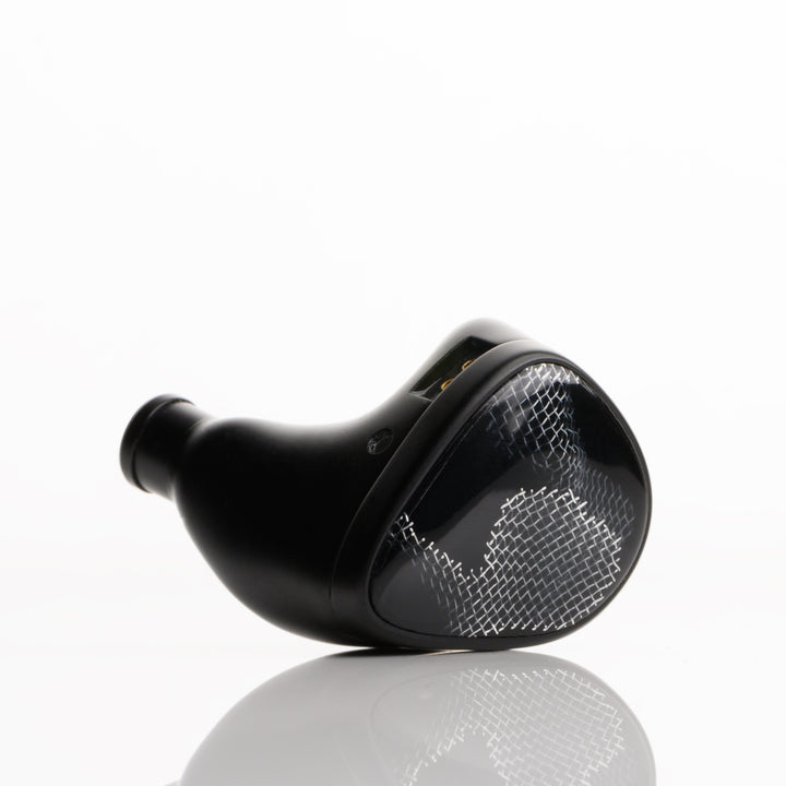 Noble Audio Onyx extreme closeup front quarter left earphone over white background