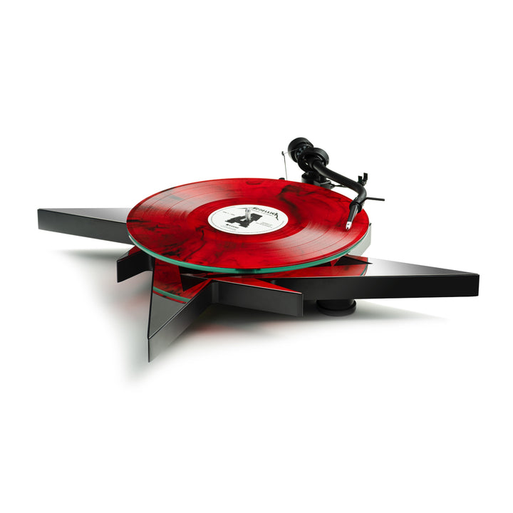 Pro-Ject Metallica turntable front quarter with red vinyl over white background