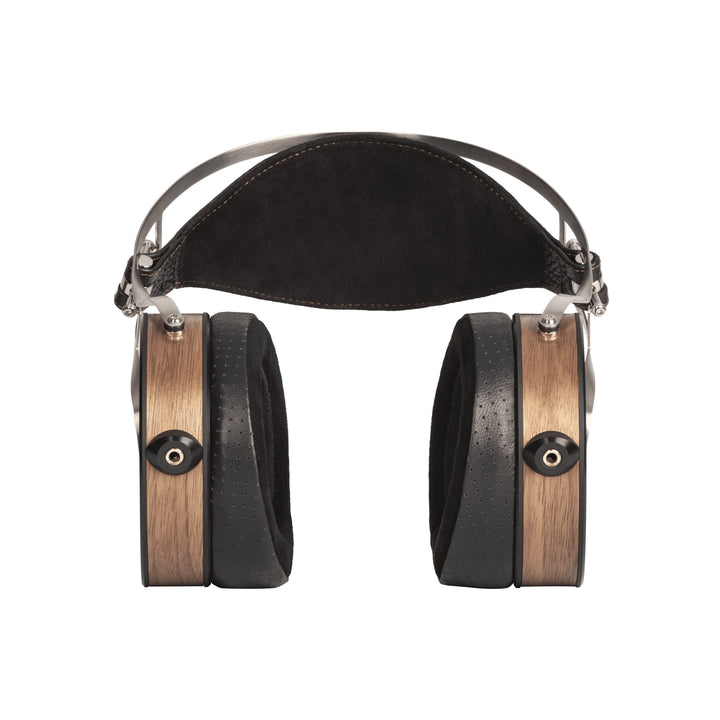 RAAL 1995 Magna EVO I with dark brown wood-grain side panels, black leather ear cushions, and a black padded headband on a white background.