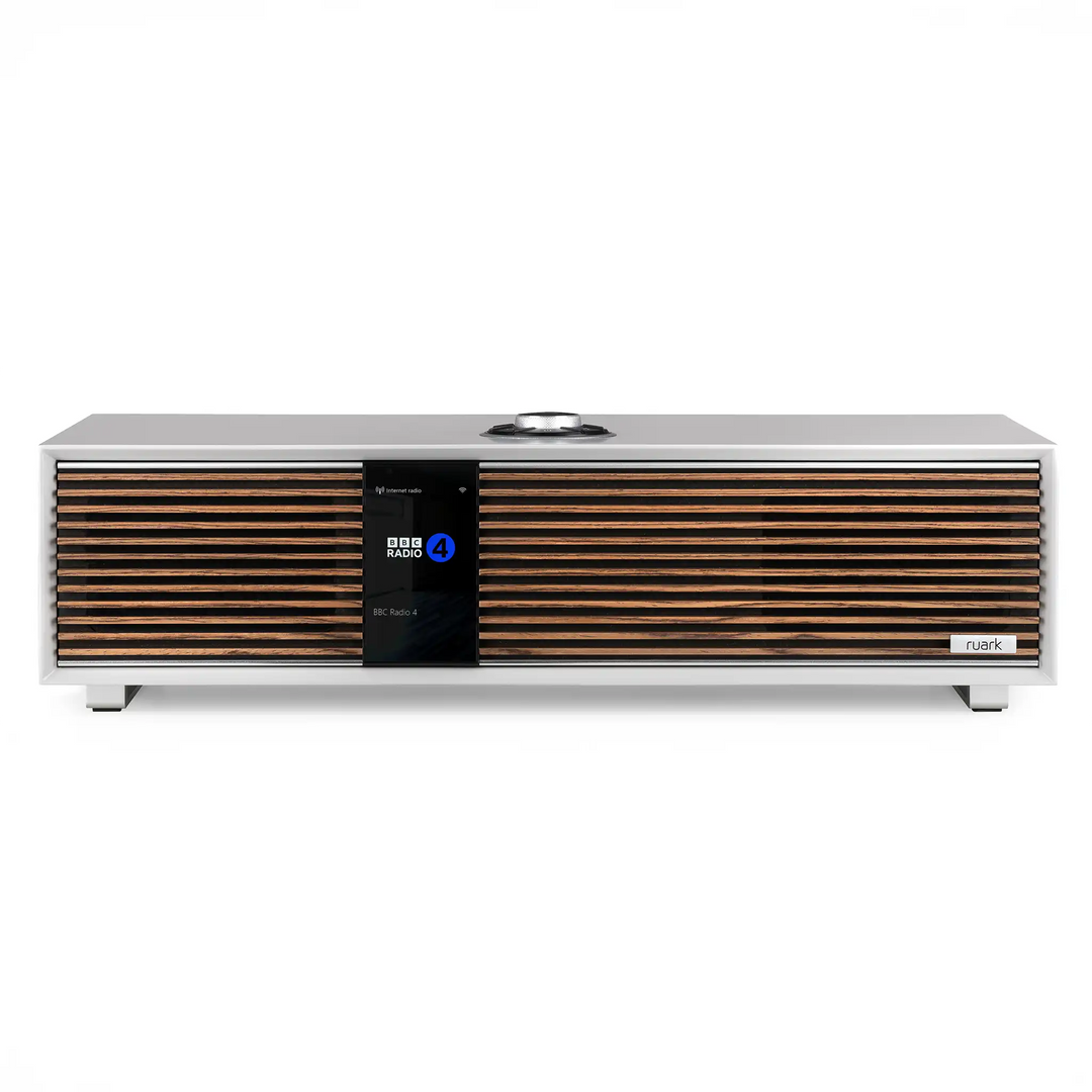 Ruark Audio R410 music system in silver sitting front center whitebox
