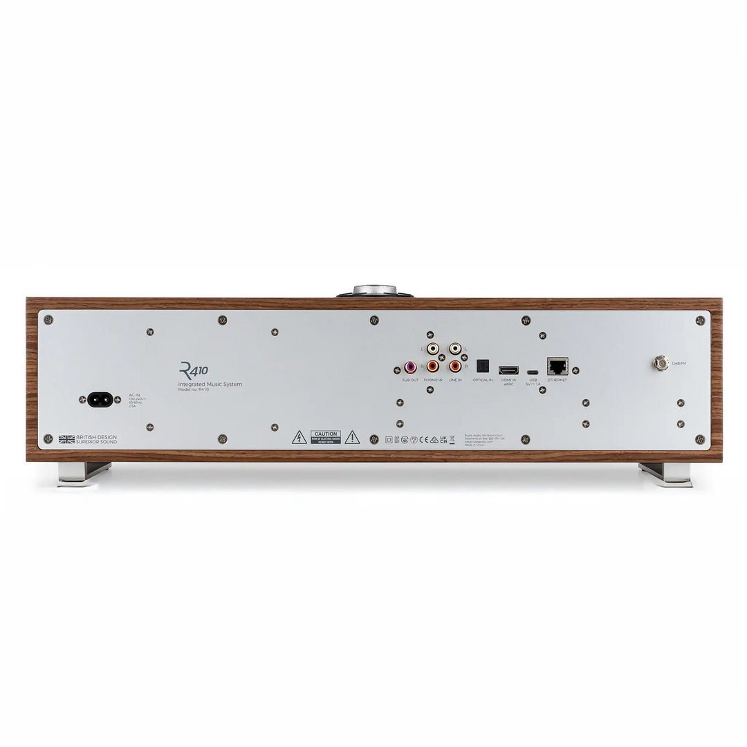 Ruark Audio R410 music system in walnut sitting rear center whitebox