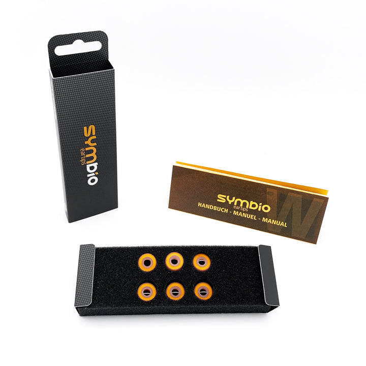 Symbio W eartips with retail packaging over white background