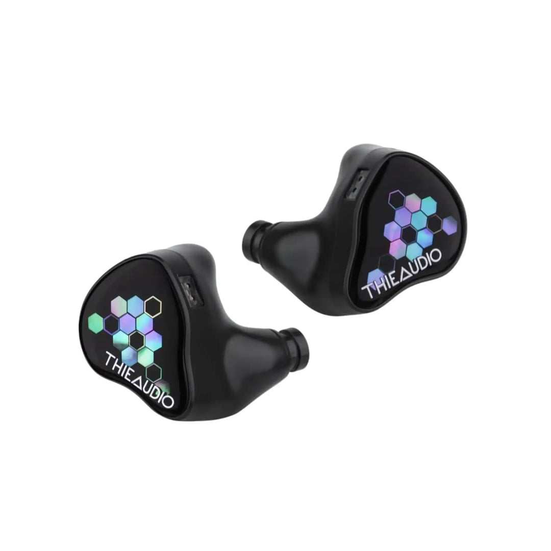 Thieaudio Monarch MKIV IEMs with Kaleidoglow faceplate floating front diagonally whitebox
