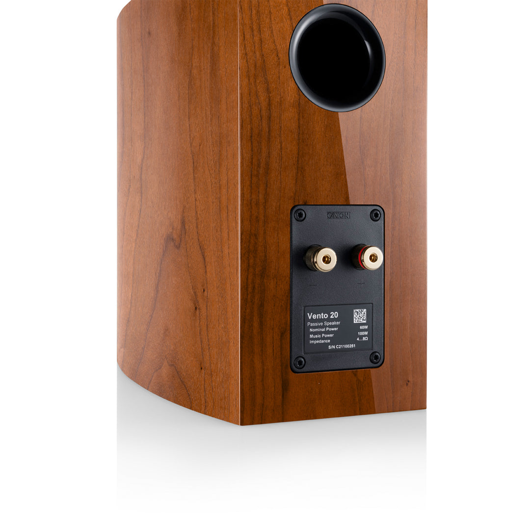 Canton Vento 20 bookshelf speaker natural walnut rear closeup speaker terminals over white background
