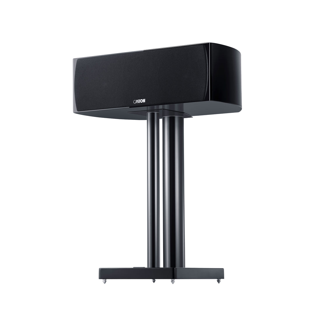 Canton Vento 50 center speaker black 3 quarter on stand with grille over white background