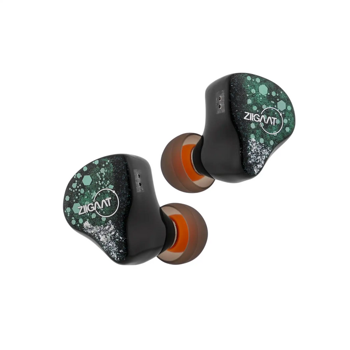 ZiiGaat Arcanis IEMs floating diagonally with eartips on whitebox
