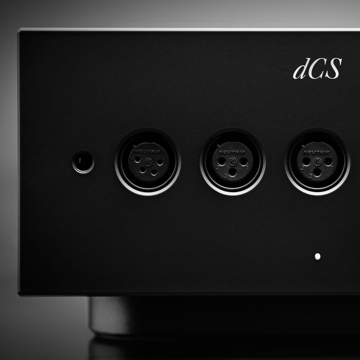 dCS Lina headphone amp black front XLR connector closeup over gray background