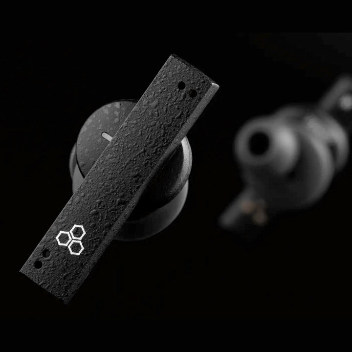 Final Audio ZE8000 black earphones front closeup over black background