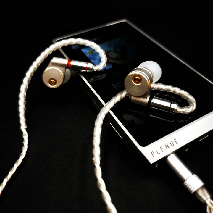 Ucotech RE-2 earphones with attached cable connected to audio player